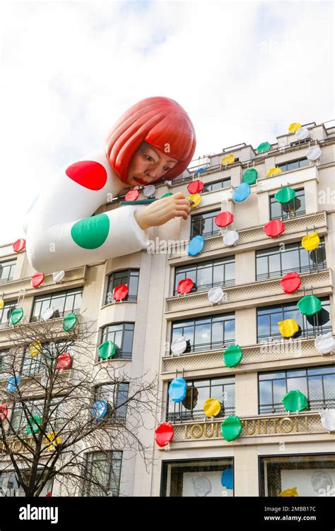 Yayoi Kusama Sculpture Peers Over Louis Vuitton's 